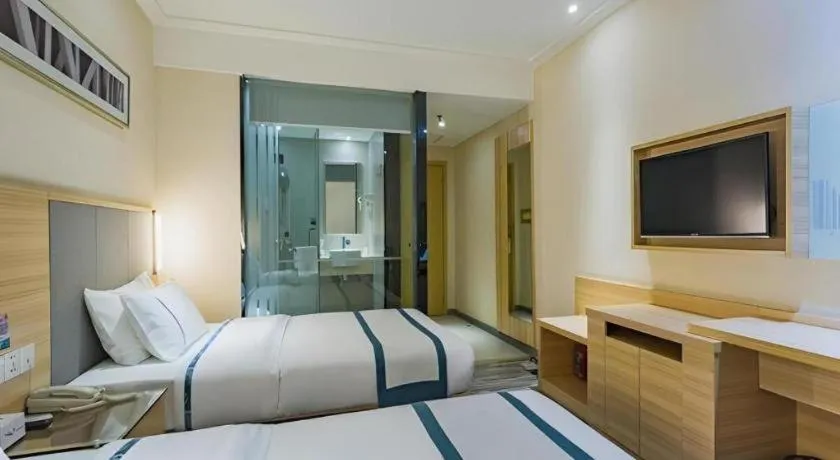 Bed in City Comfort Inn Guangzhou Tianhe District Tangxia Exhibition Center