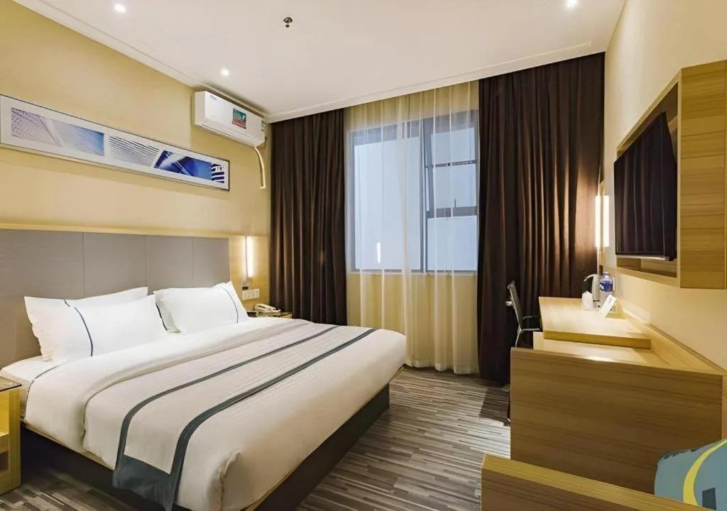 Bed in City Comfort Inn Guangzhou Tianhe District Tangxia Exhibition Center