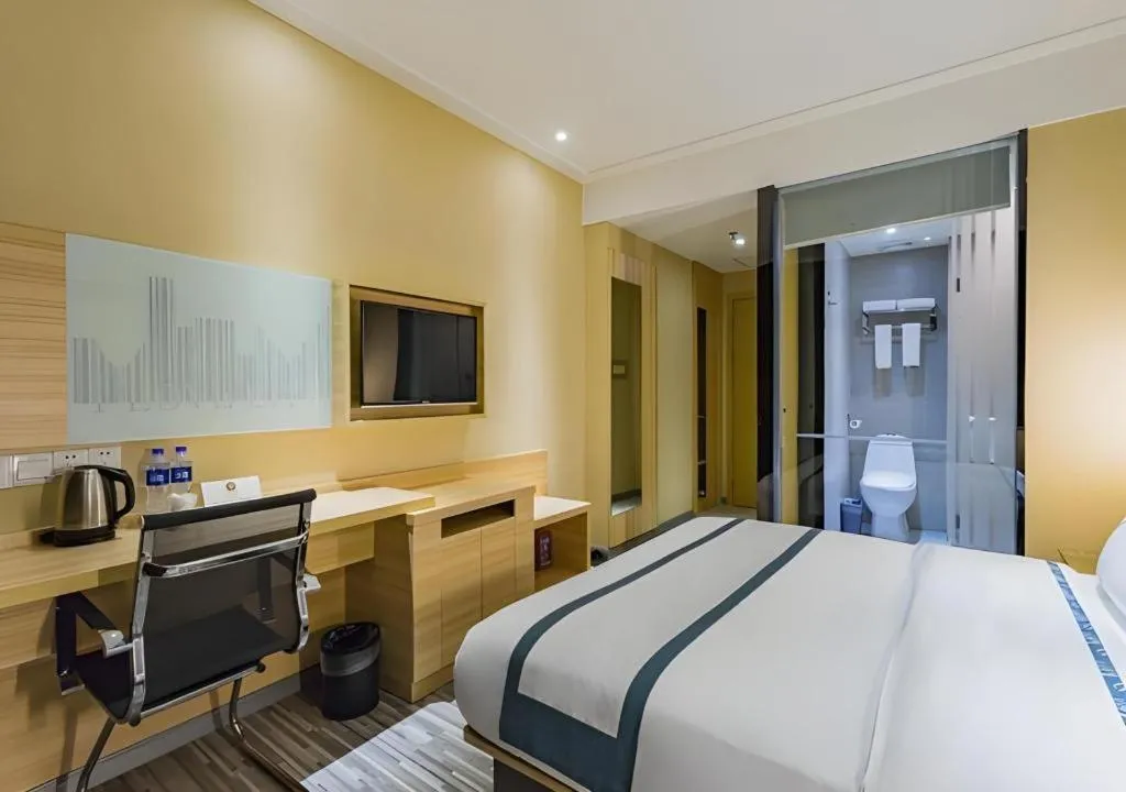 Bed in City Comfort Inn Guangzhou Tianhe District Tangxia Exhibition Center