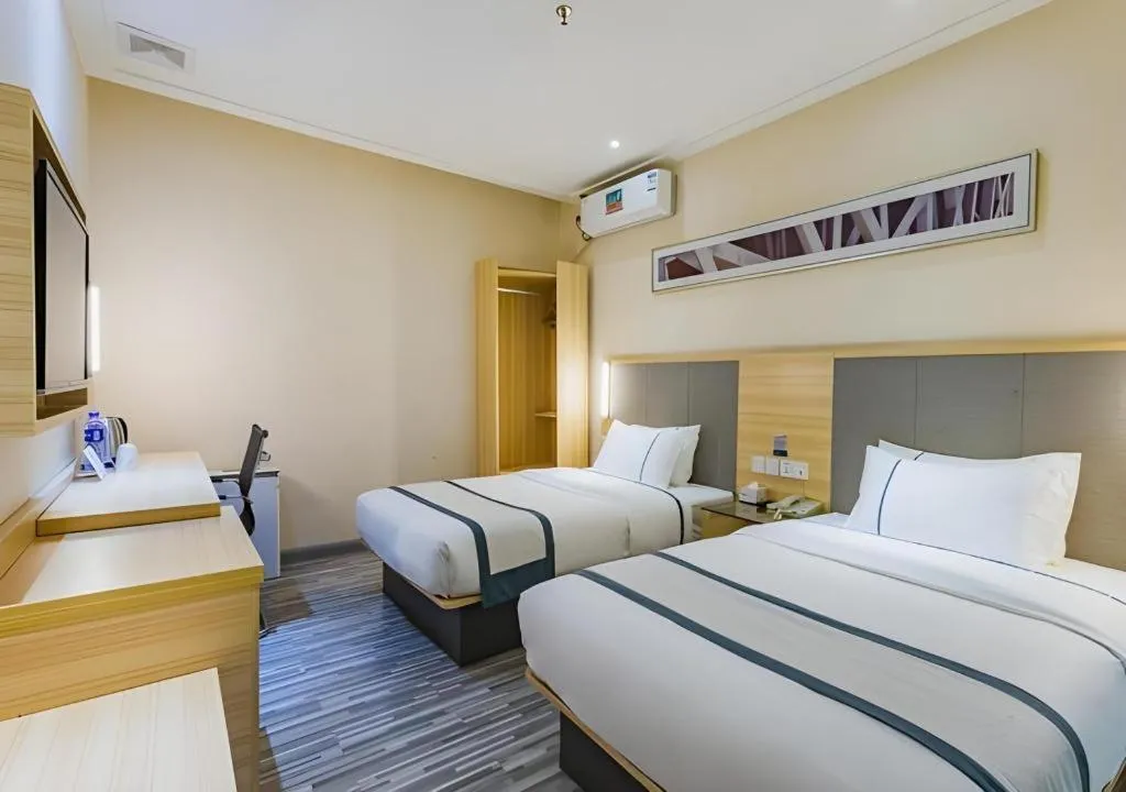 Bed in City Comfort Inn Guangzhou Tianhe District Tangxia Exhibition Center