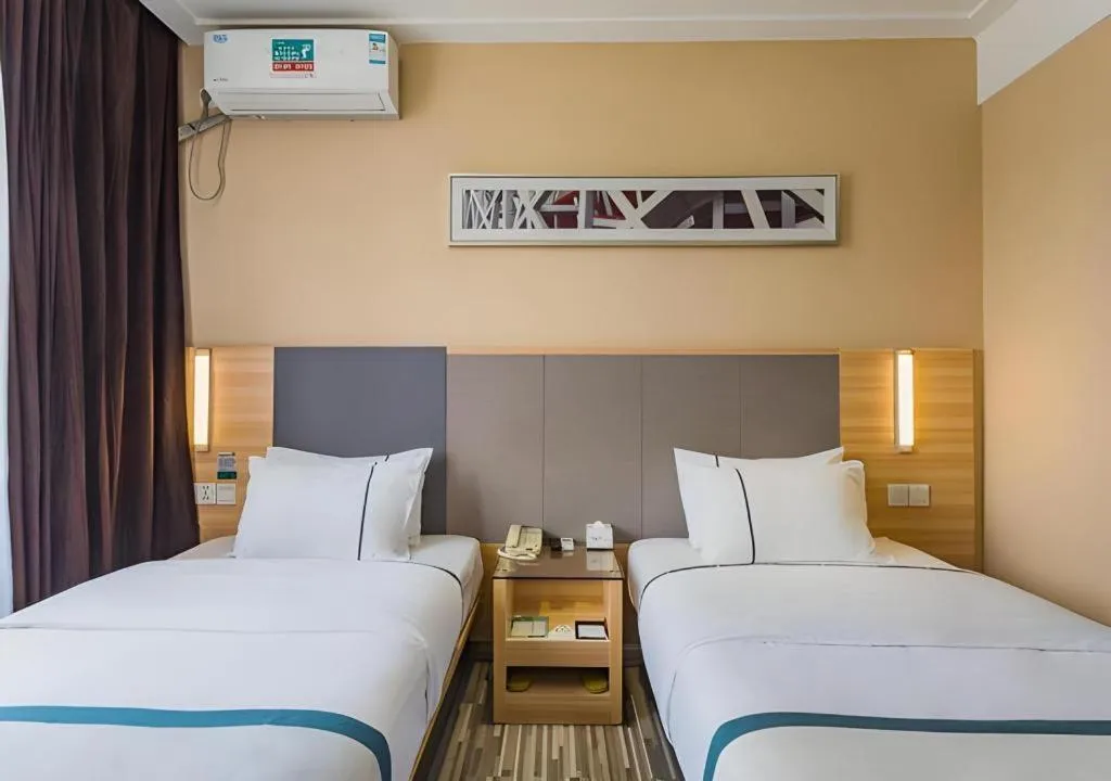 Bed in City Comfort Inn Guangzhou Tianhe District Tangxia Exhibition Center