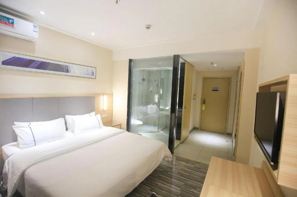 Bed in City Comfort Inn Guangzhou Tianhe District Tangxia Exhibition Center