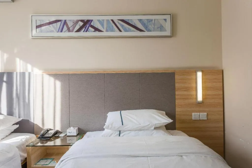 Bed in City Comfort Inn Guangzhou Tianhe District Tangxia Exhibition Center