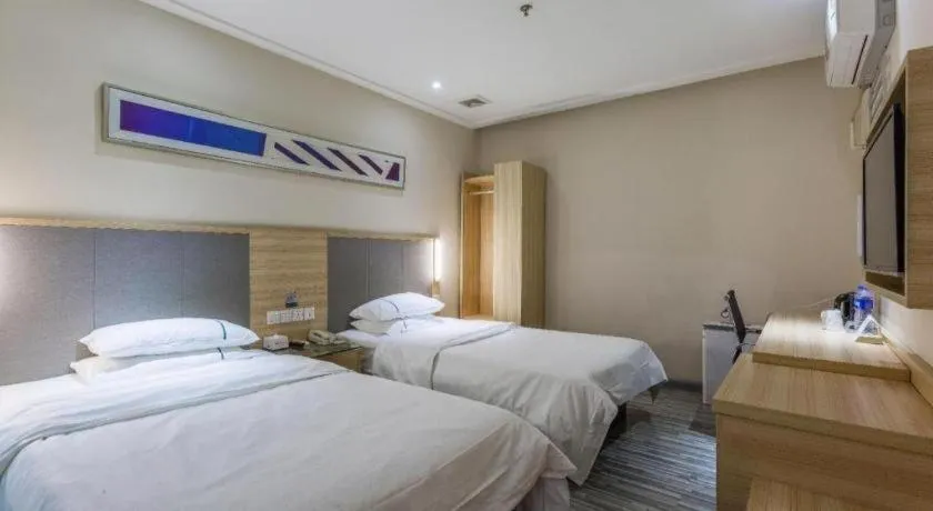 Bed in City Comfort Inn Guangzhou Tianhe District Tangxia Exhibition Center