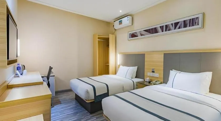 Bed in City Comfort Inn Guangzhou Tianhe District Tangxia Exhibition Center