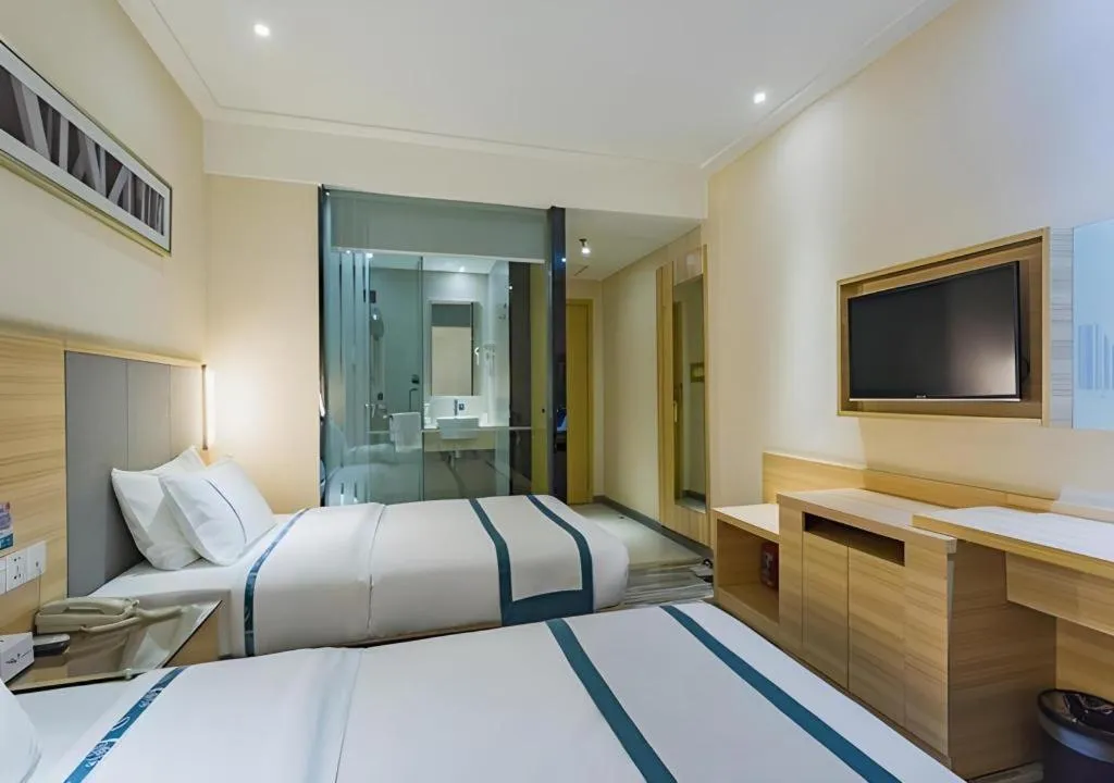 Bed in City Comfort Inn Guangzhou Tianhe District Tangxia Exhibition Center