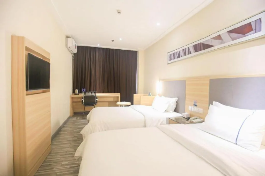 Bed in City Comfort Inn Guangzhou Tianhe District Tangxia Exhibition Center