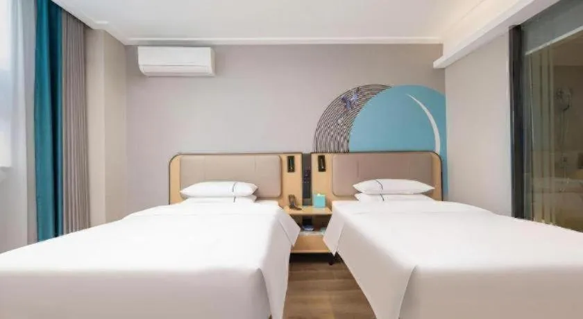 Bed in City Comfort Inn Wuhan Jinyinhu Garden Expo Park