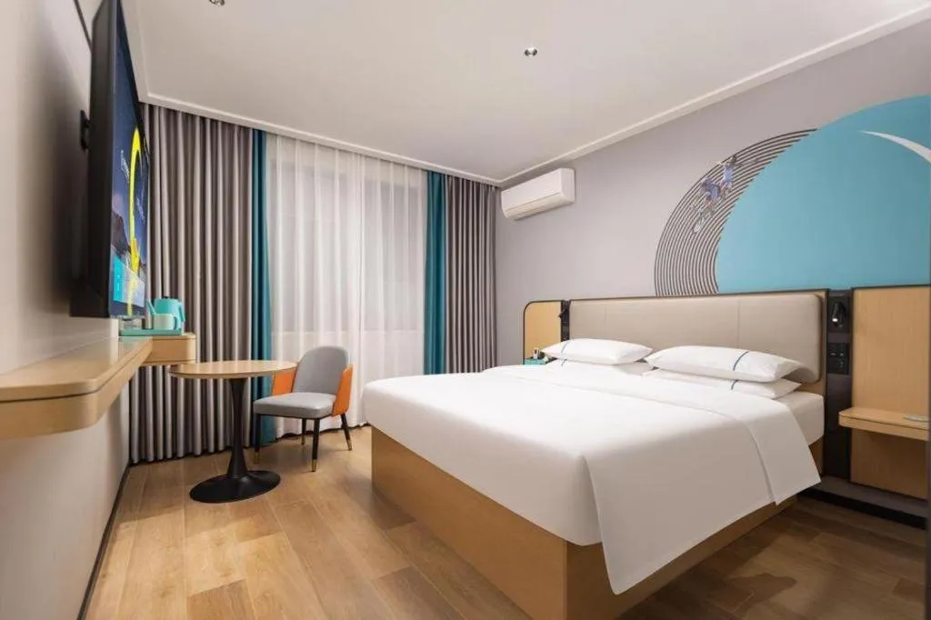 Bed in City Comfort Inn Wuhan Jinyinhu Garden Expo Park