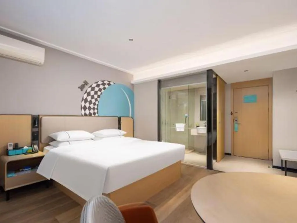 Bed in City Comfort Inn Wuhan Jinyinhu Garden Expo Park