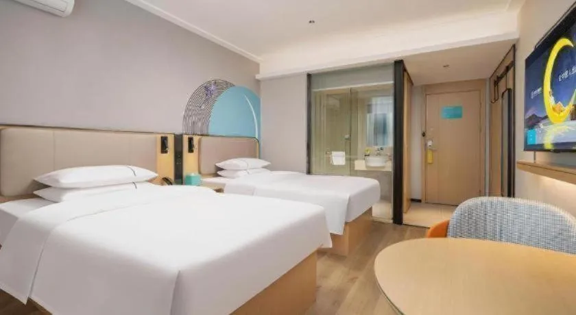 Bed in City Comfort Inn Wuhan Jinyinhu Garden Expo Park