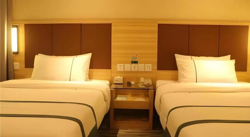 Bed in City Comfort Inn Wuhan Jinyinhu Garden Expo Park