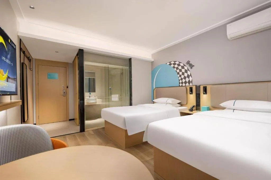 Bed in City Comfort Inn Wuhan Jinyinhu Garden Expo Park