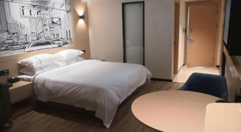 Bed in City Comfort Inn Wuhan Jinyinhu Garden Expo Park