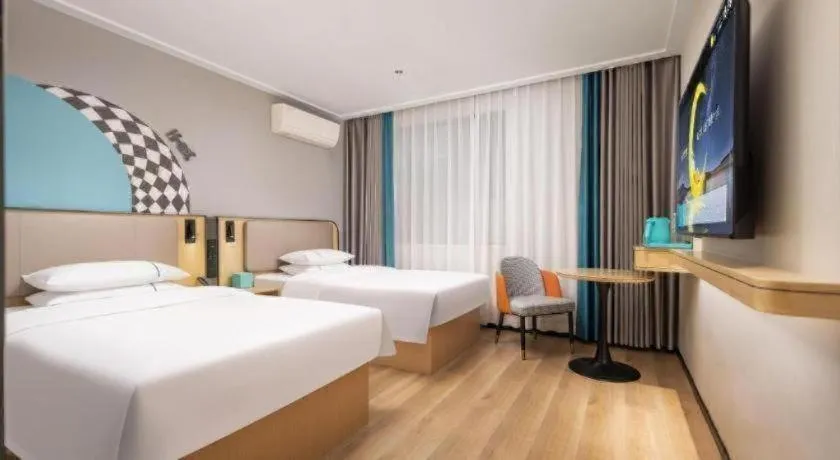 Bed in City Comfort Inn Wuhan Jinyinhu Garden Expo Park