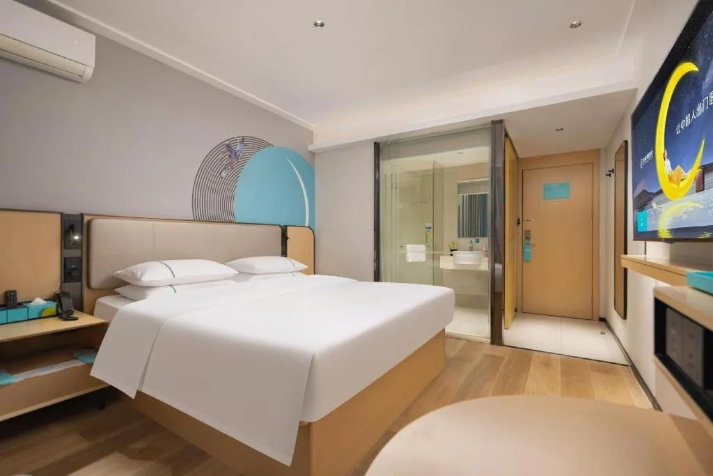 Bed in City Comfort Inn Wuhan Jinyinhu Garden Expo Park