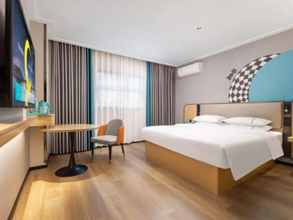 Bed in City Comfort Inn Wuhan Jinyinhu Garden Expo Park