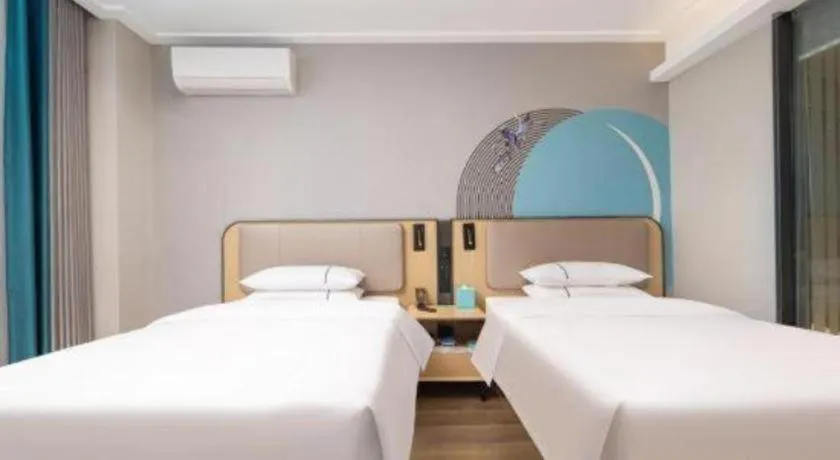 Bed in City Comfort Inn Wuhan Jinyinhu Garden Expo Park