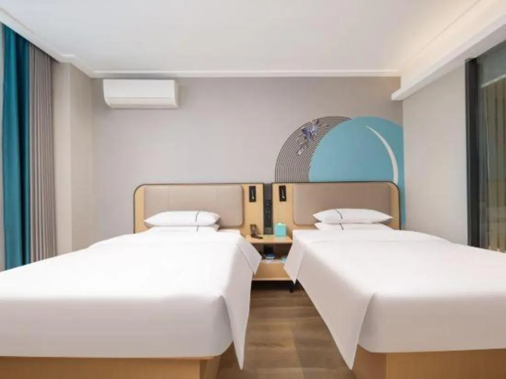 Bed in City Comfort Inn Wuhan Jinyinhu Garden Expo Park