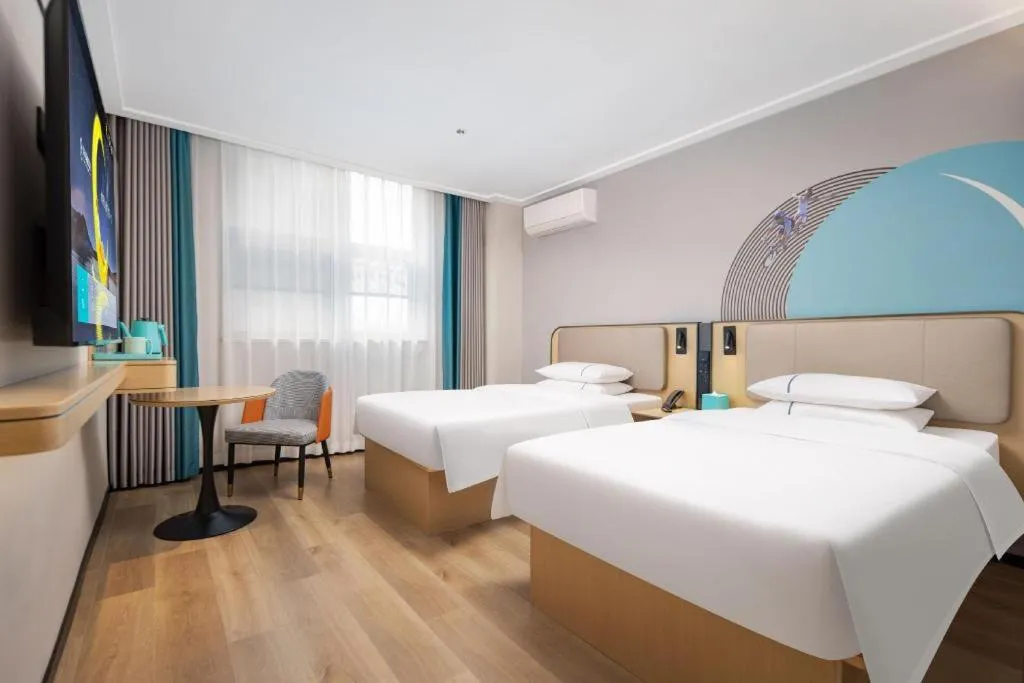 Bed in City Comfort Inn Wuhan Jinyinhu Garden Expo Park