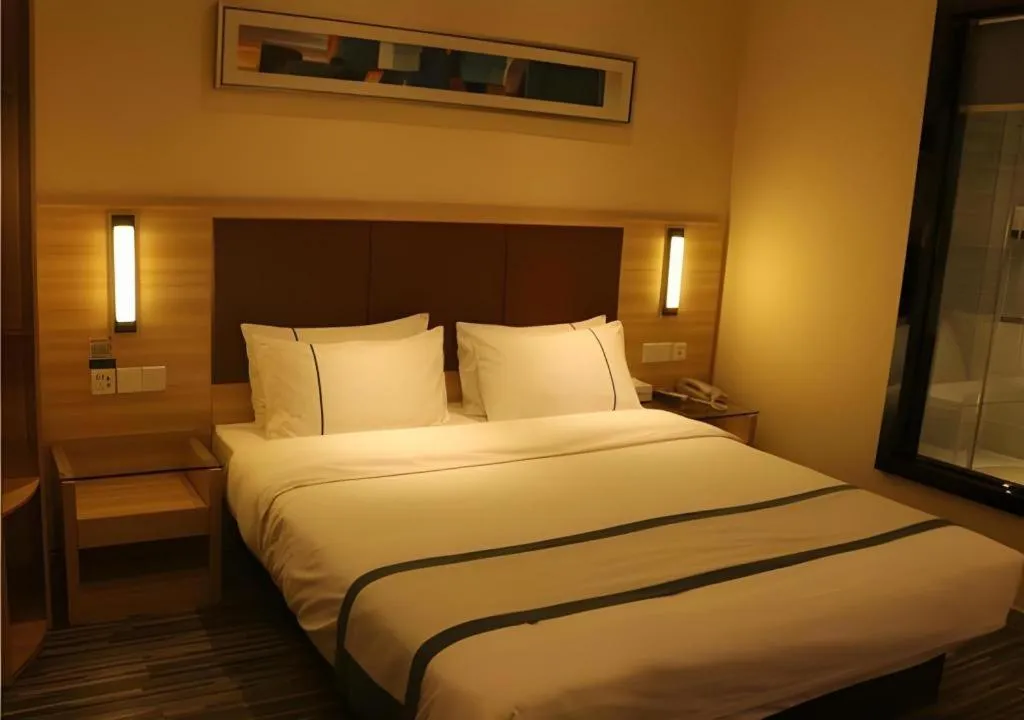 Bed in City Comfort Inn Wuhan Jinyinhu Garden Expo Park