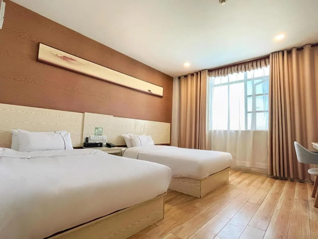 Bed in Jtour Inn Fengcheng Railway Station Jianyi Avenue Xincheng
