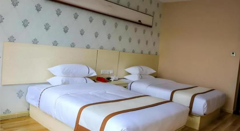 Bed in Jtour Inn Fengcheng Railway Station Jianyi Avenue Xincheng