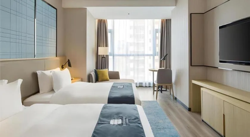 Bed in Echarm Hotel Changsha High-speed Railway Station