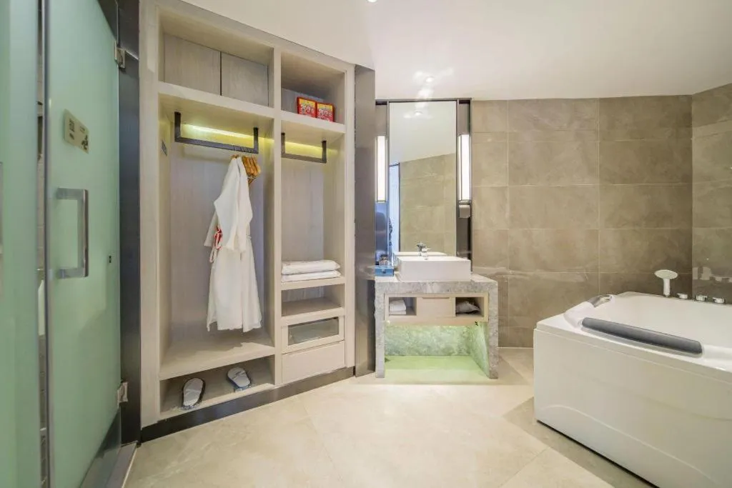 Bed in Echarm Hotel Changsha Guihua Park Metro Station