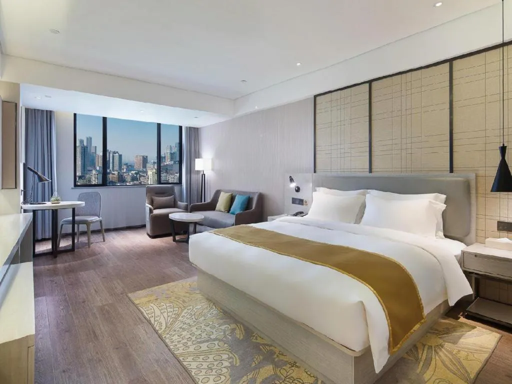 Bed in Echarm Hotel Changsha Guihua Park Metro Station