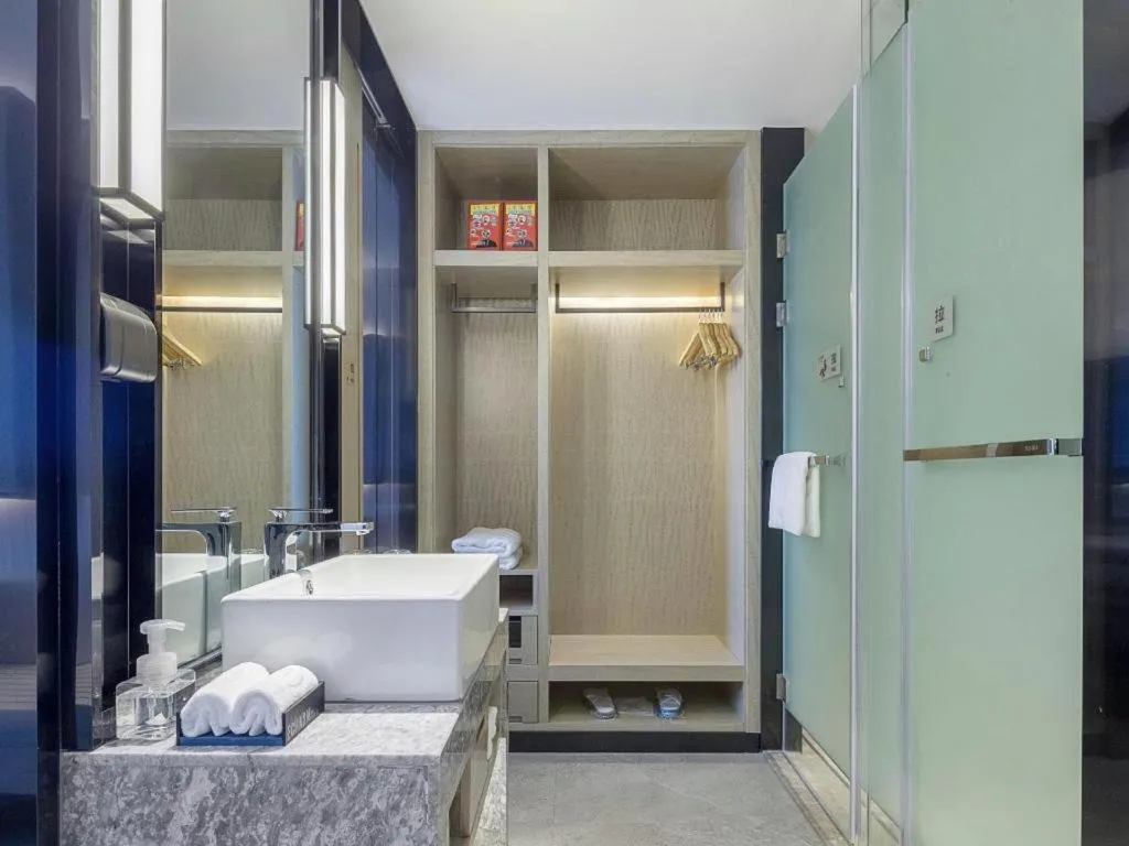 Bed in Echarm Hotel Changsha Guihua Park Metro Station