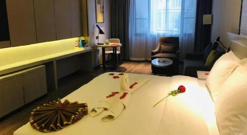 Bed in Echarm Hotel Changsha Guihua Park Metro Station