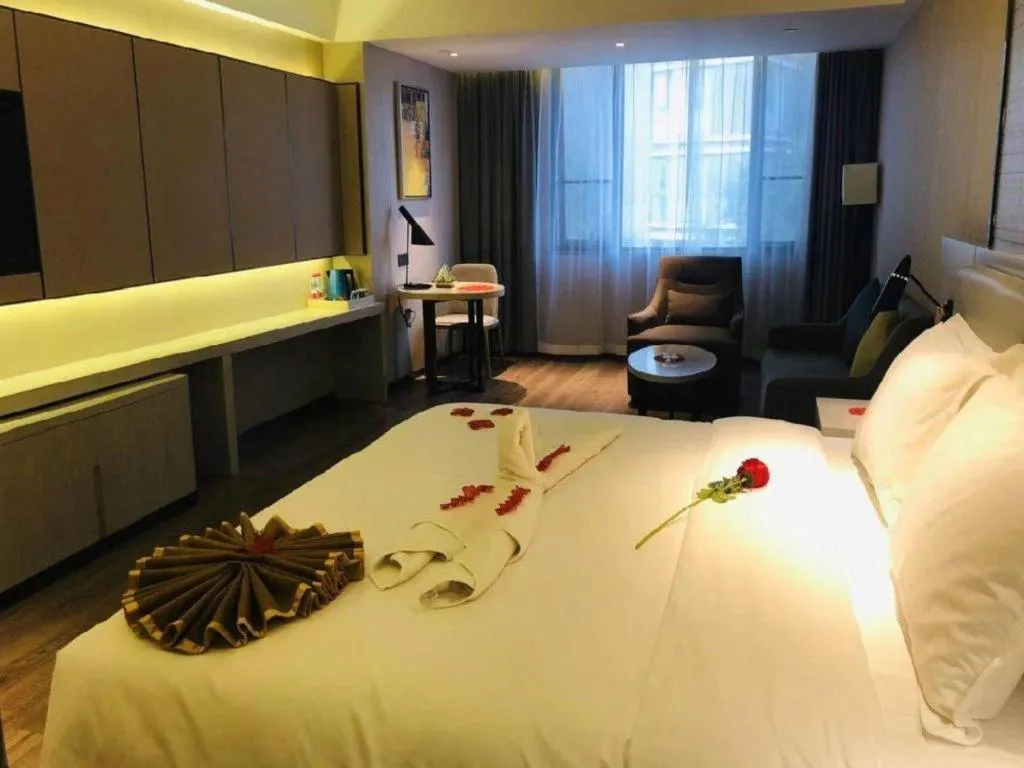 Bed in Echarm Hotel Changsha Guihua Park Metro Station