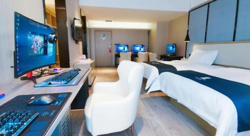 Bed in Echarm Hotel Xinyu Railway Station Baoshi Park