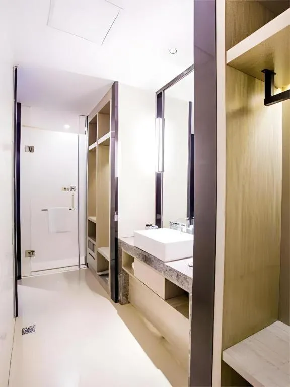 Bed in Echarm Hotel Xinyu Railway Station Baoshi Park