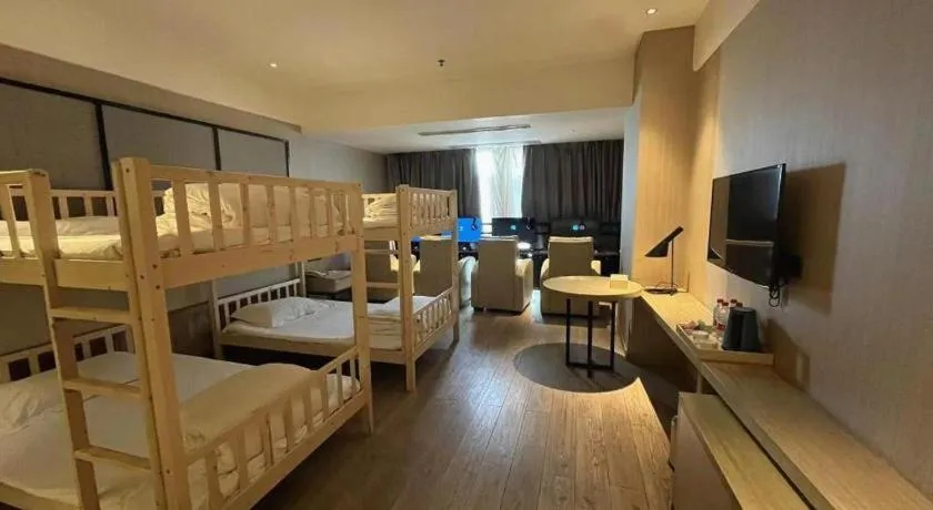 Bed in Echarm Hotel Xinyu Railway Station Baoshi Park