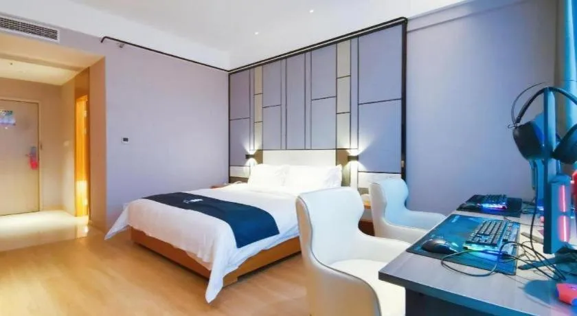 Bed in Echarm Hotel Xinyu Railway Station Baoshi Park