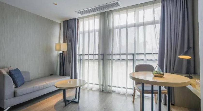 Echarm Hotel Xinyu Railway Station Baoshi Park