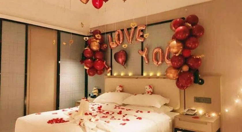 Bed in Echarm Hotel Xinyu Railway Station Baoshi Park