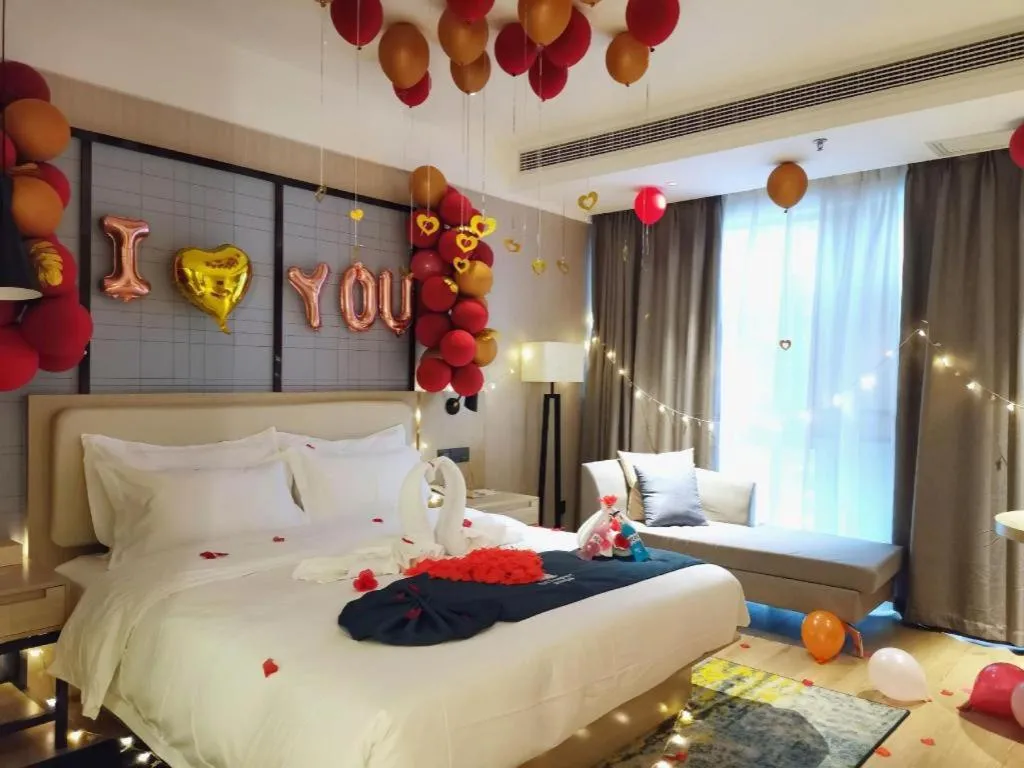 Bed in Echarm Hotel Xinyu Railway Station Baoshi Park