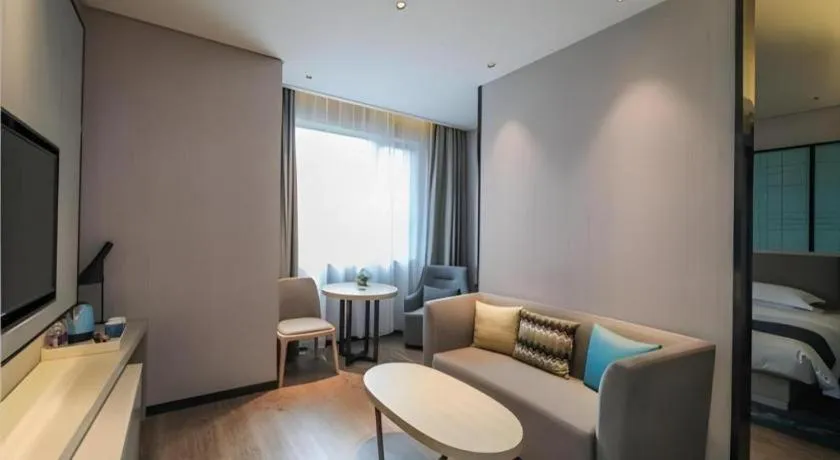 Bed in Echarm Hotel Nanjing Jiangning Tianyin Avenue Metro Station