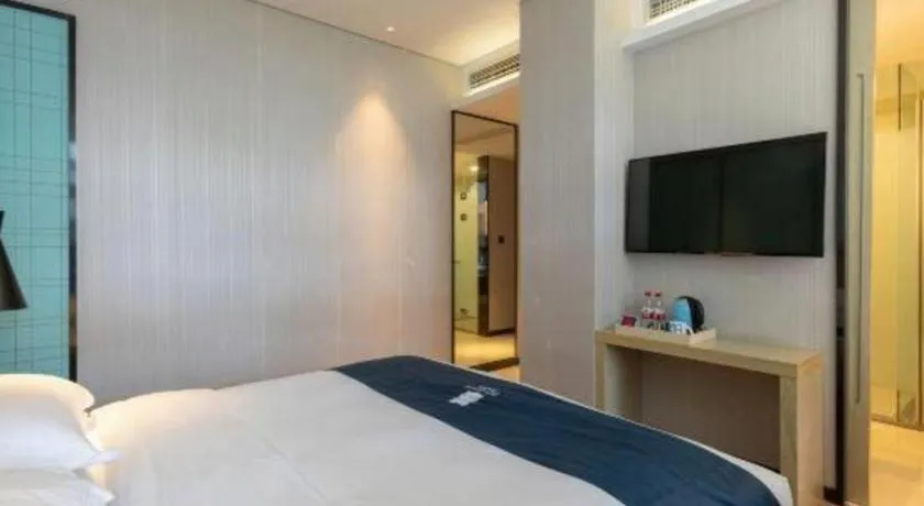 Bed in Echarm Hotel Nanjing Jiangning Tianyin Avenue Metro Station