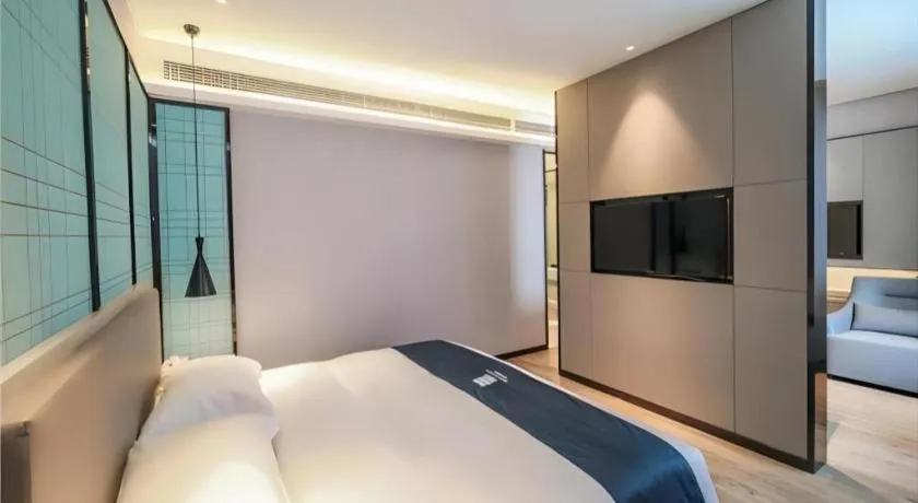 Bed in Echarm Hotel Nanjing Jiangning Tianyin Avenue Metro Station