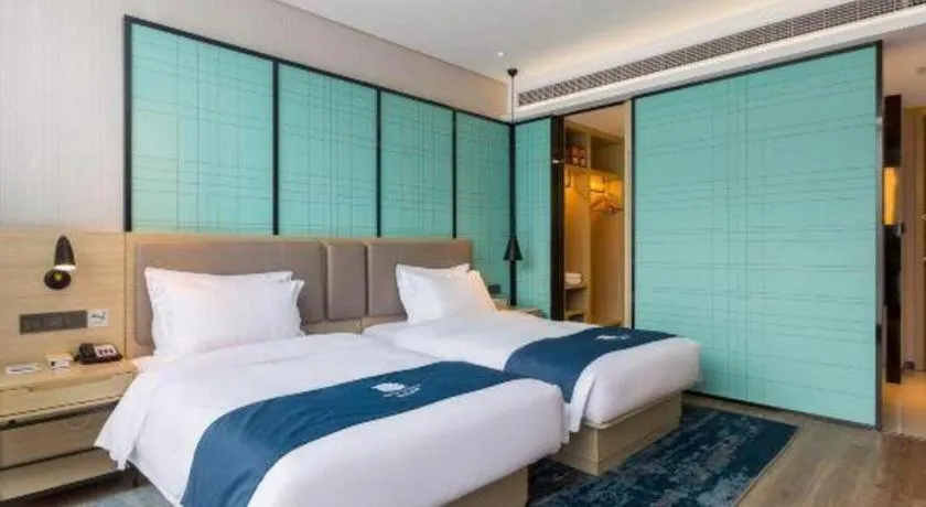 Bed in Echarm Hotel Nanjing Jiangning Tianyin Avenue Metro Station