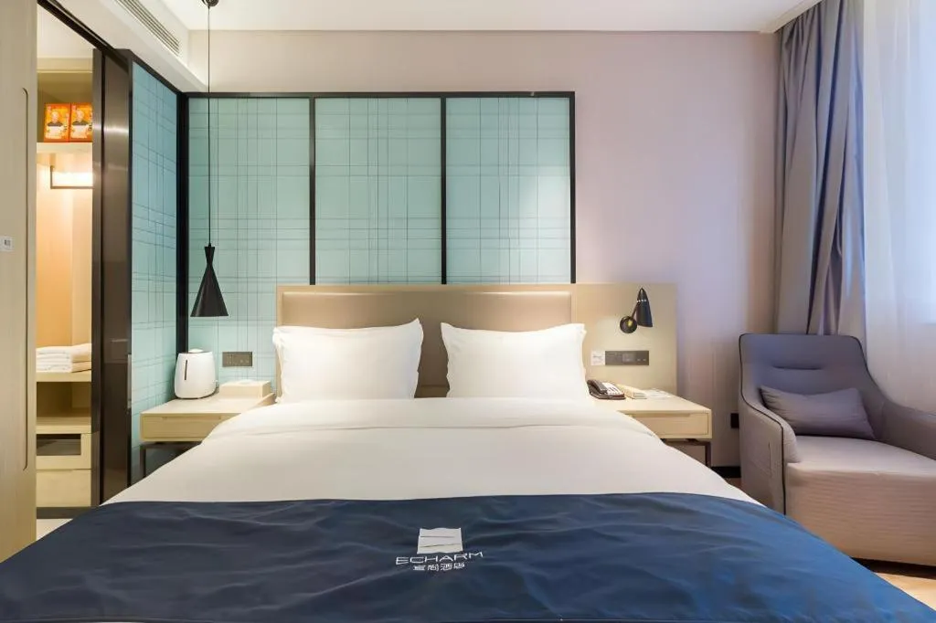 Bed in Echarm Hotel Nanjing Jiangning Tianyin Avenue Metro Station