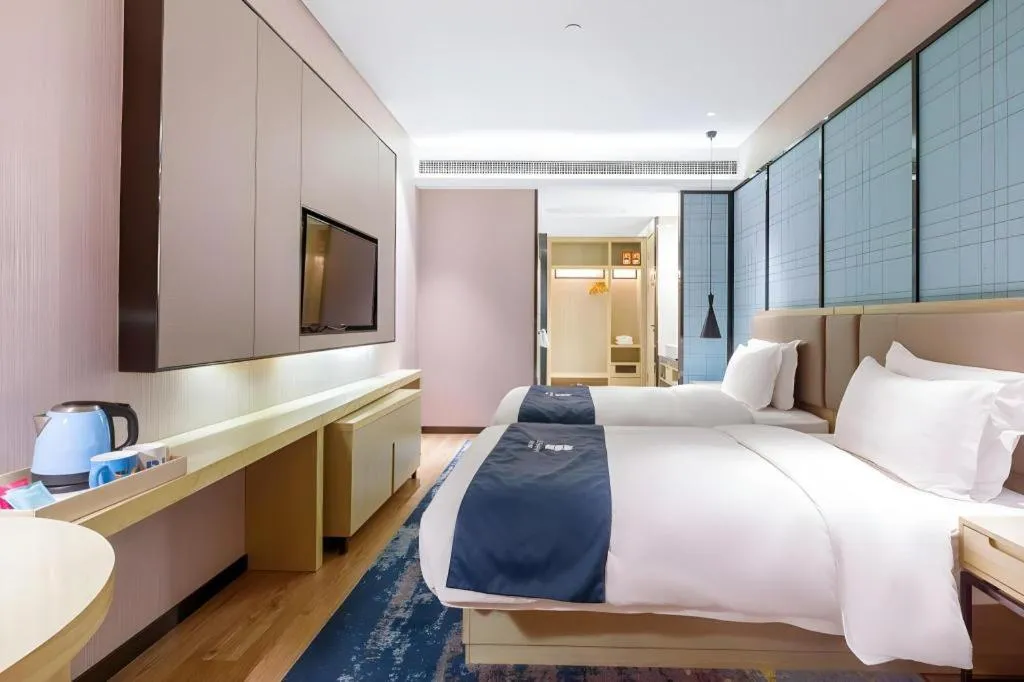 Bed in Echarm Hotel Nanjing Jiangning Tianyin Avenue Metro Station