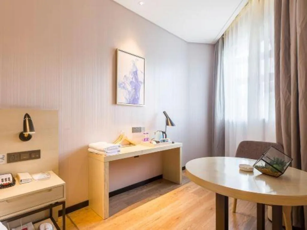 Bed in Echarm Hotel Nanjing Jiangning Tianyin Avenue Metro Station