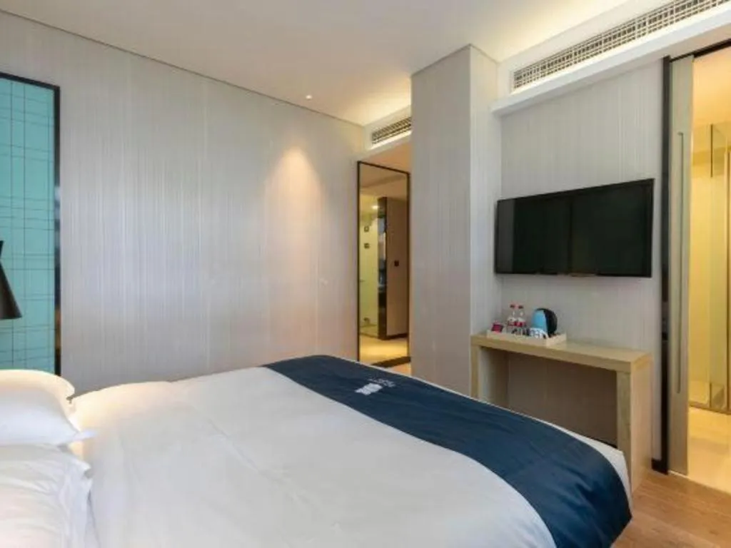 Bed in Echarm Hotel Nanjing Jiangning Tianyin Avenue Metro Station