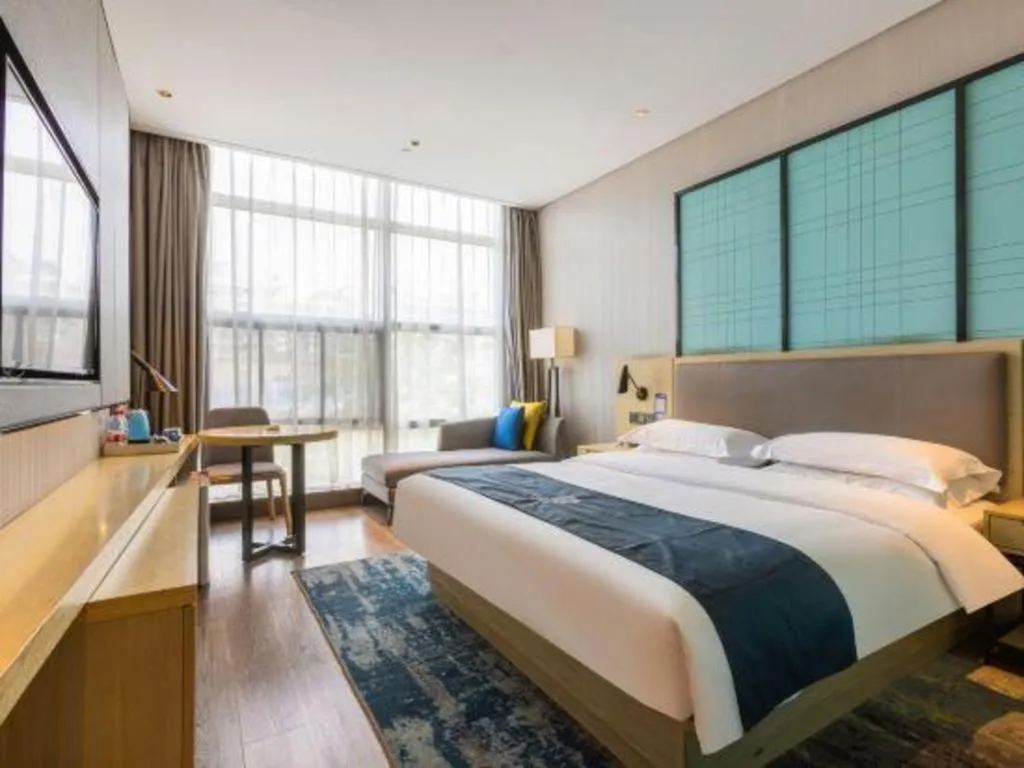 Bed in Echarm Hotel Nanjing Jiangning Tianyin Avenue Metro Station