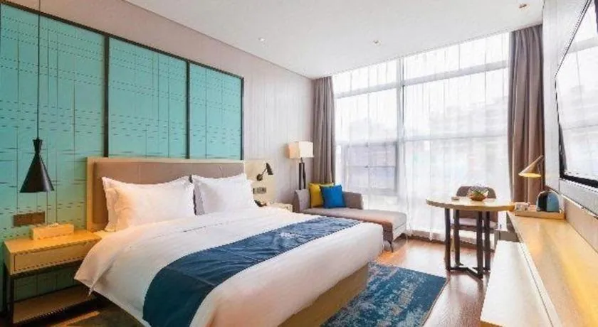 Bed in Echarm Hotel Nanjing Jiangning Tianyin Avenue Metro Station